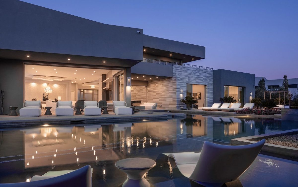 Modern Custom Home with Infinity Pool at Twilight